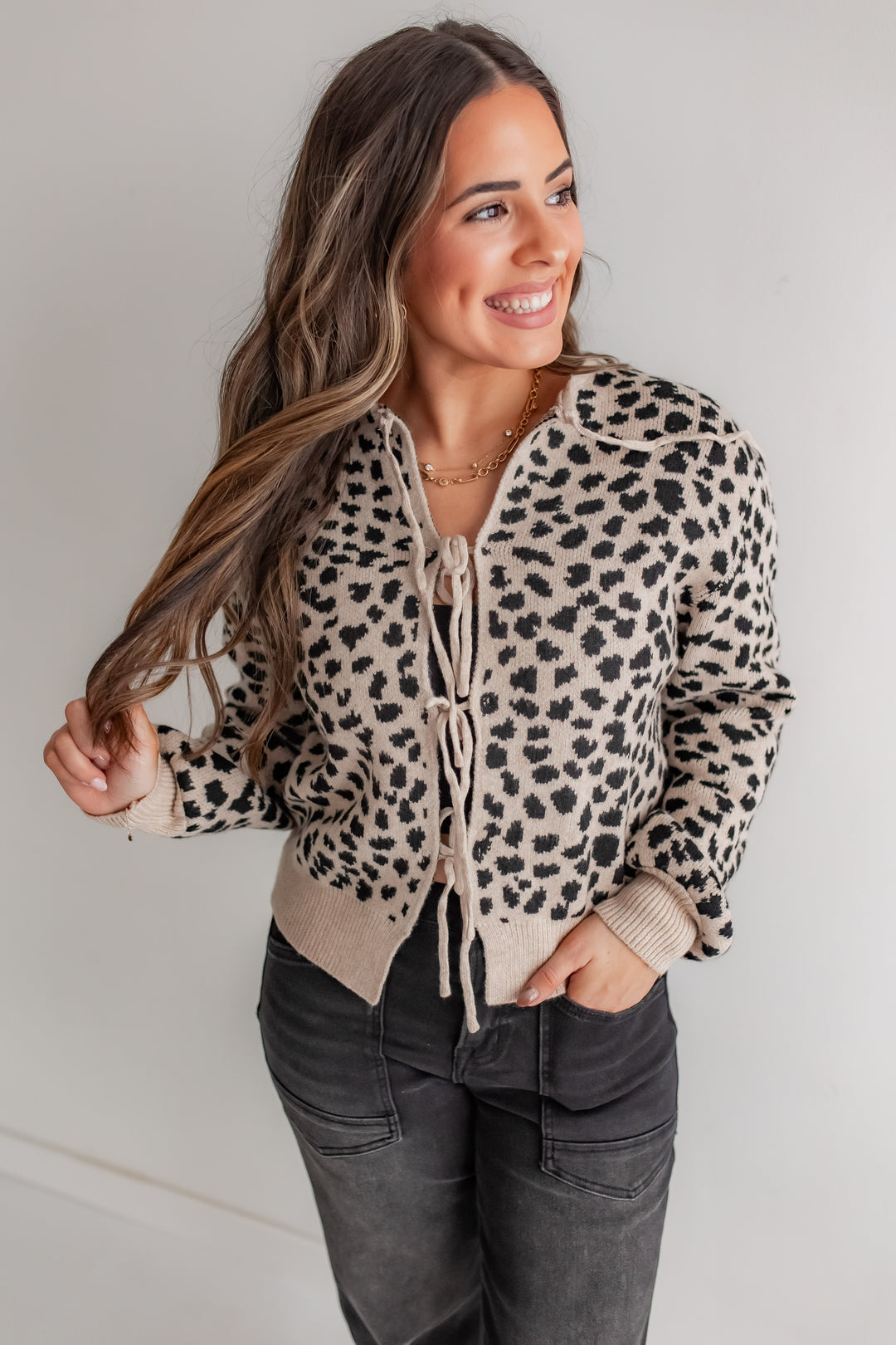 Alia leopard tie sweater top for women