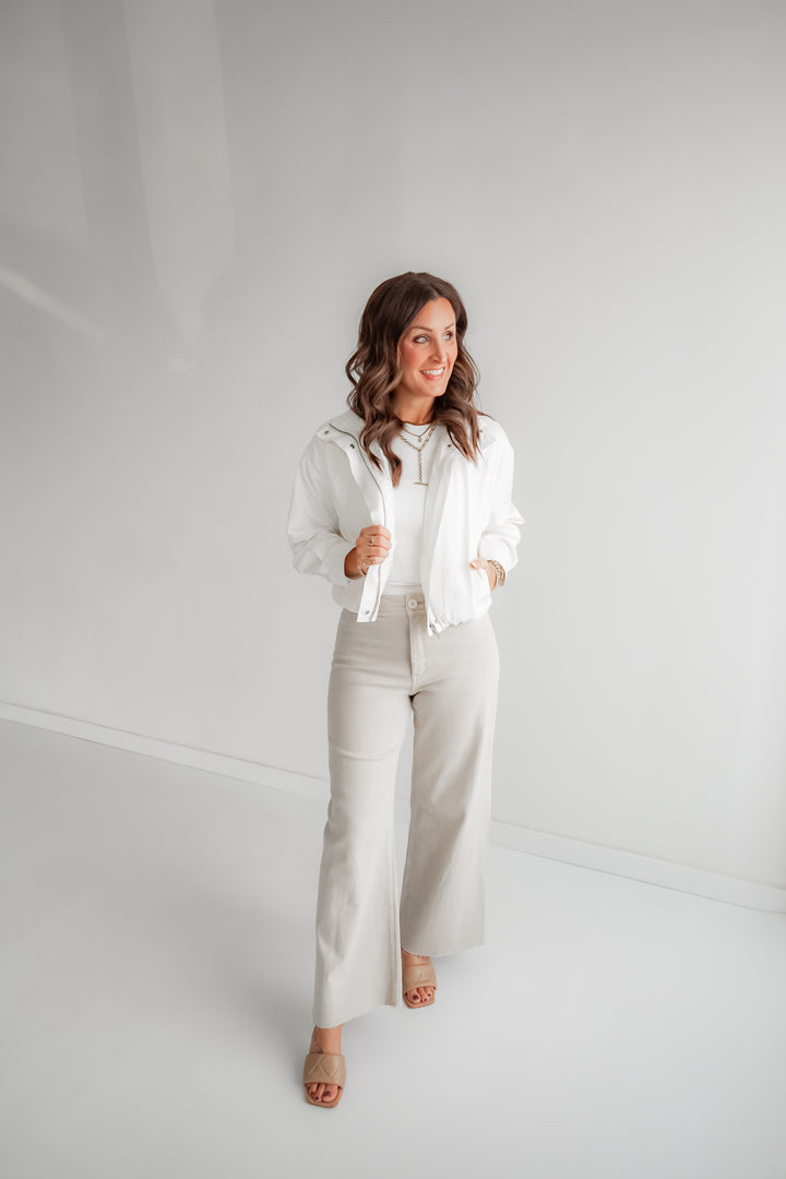 Modern neutral bomber jacket for spring outfits