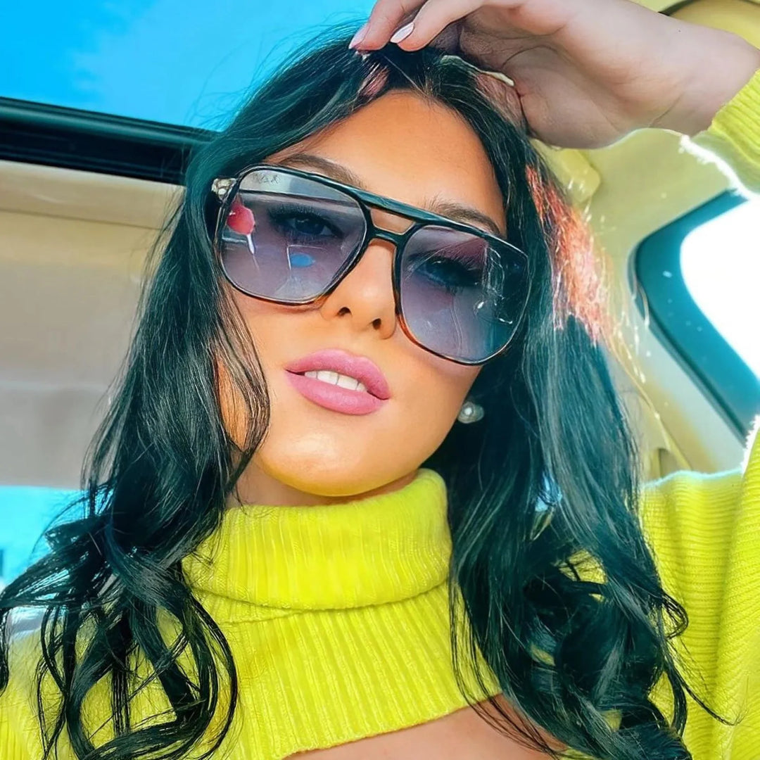 Black Skye sunglasses from DAX on a model