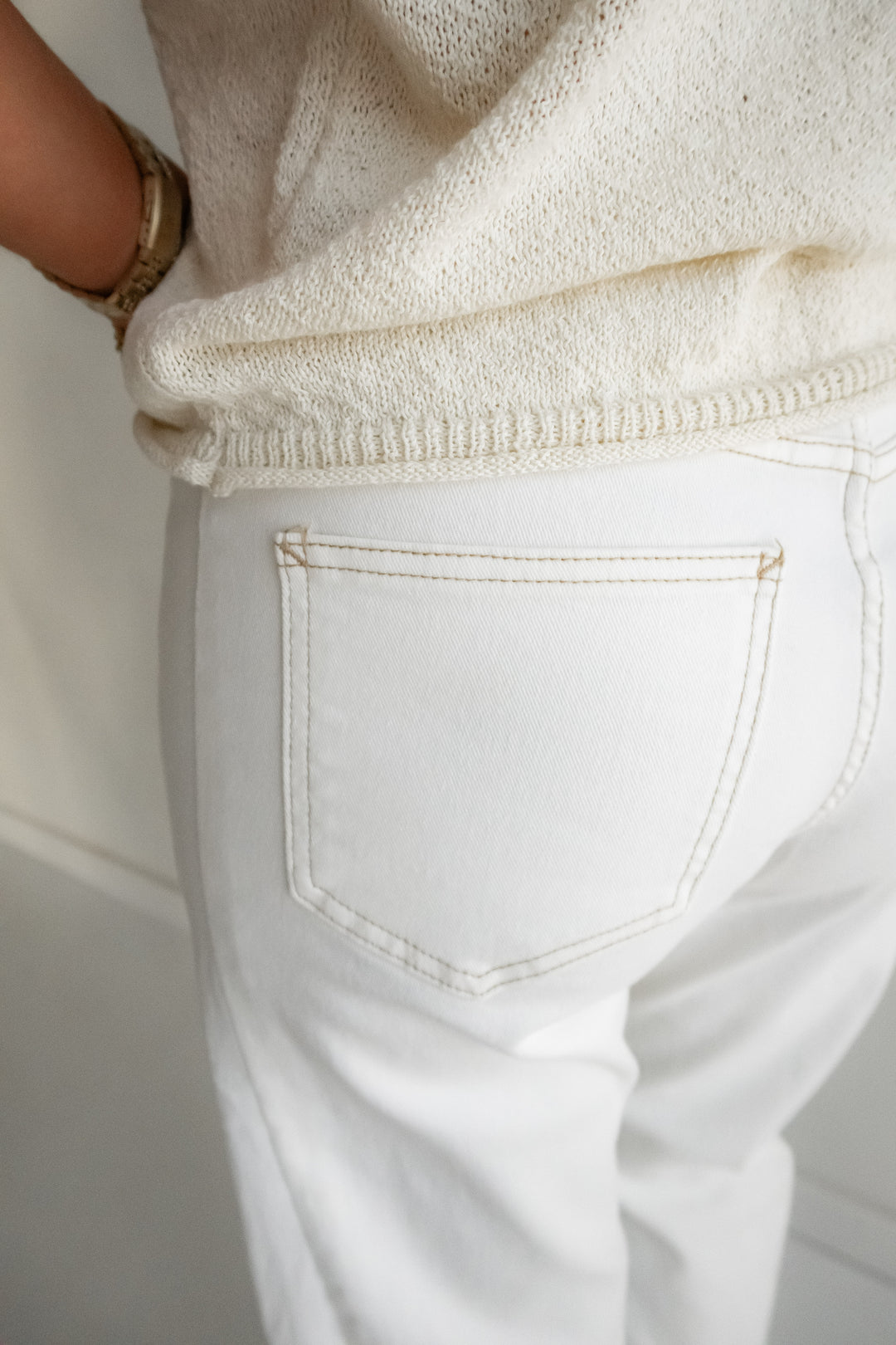 Creamy white denim with tan stitching women