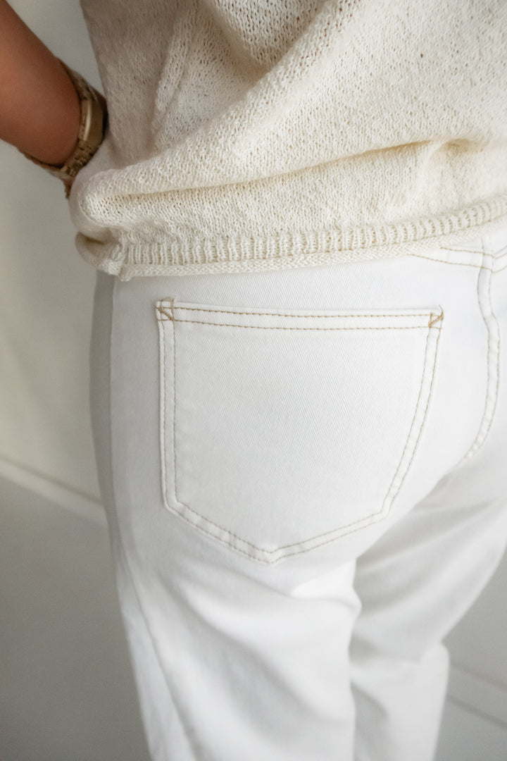 Creamy white denim with tan stitching women