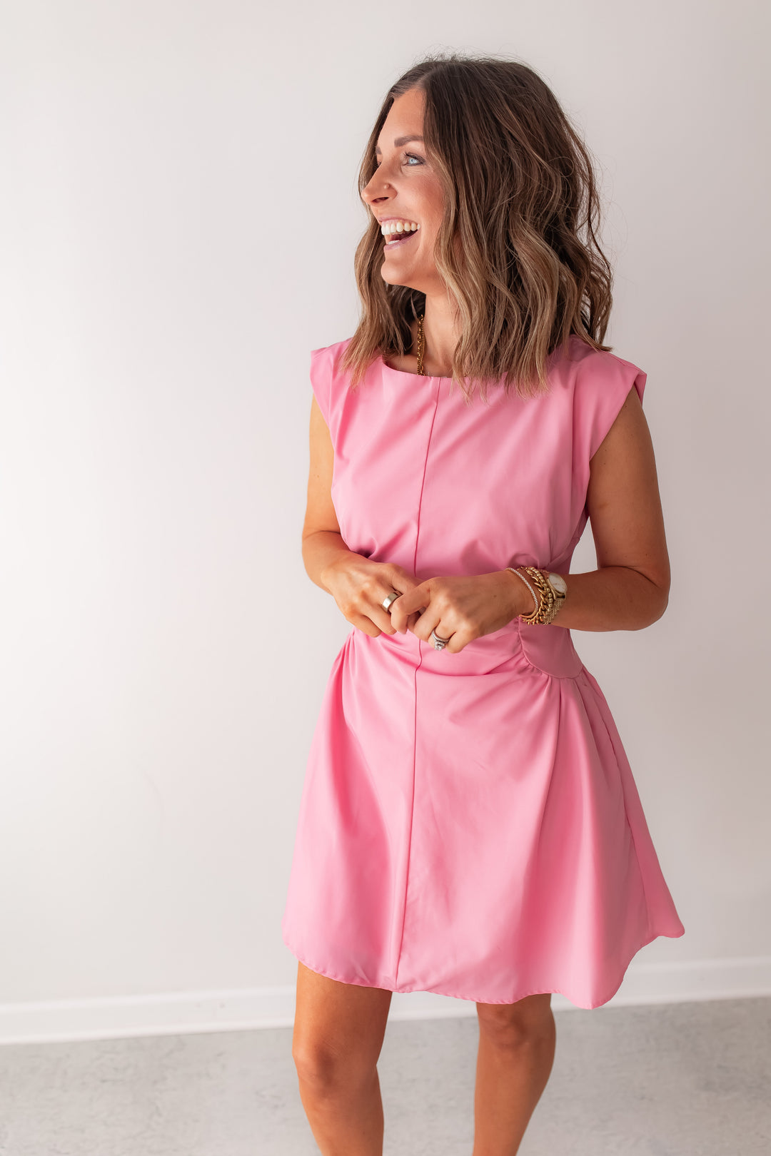 pink fit and flare mini dress with flattering waist detail