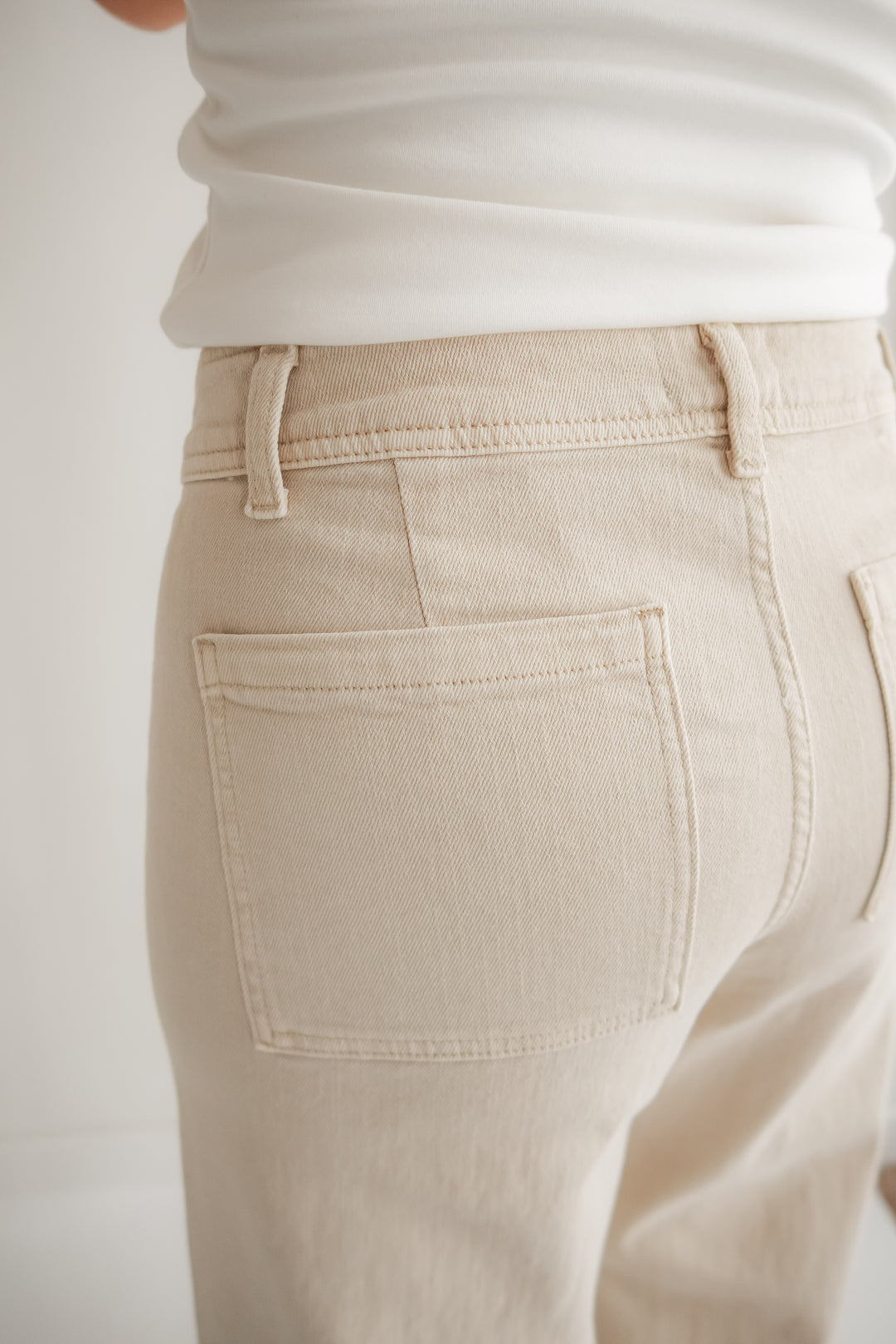 Wide leg denim pants styled for office or casual wear