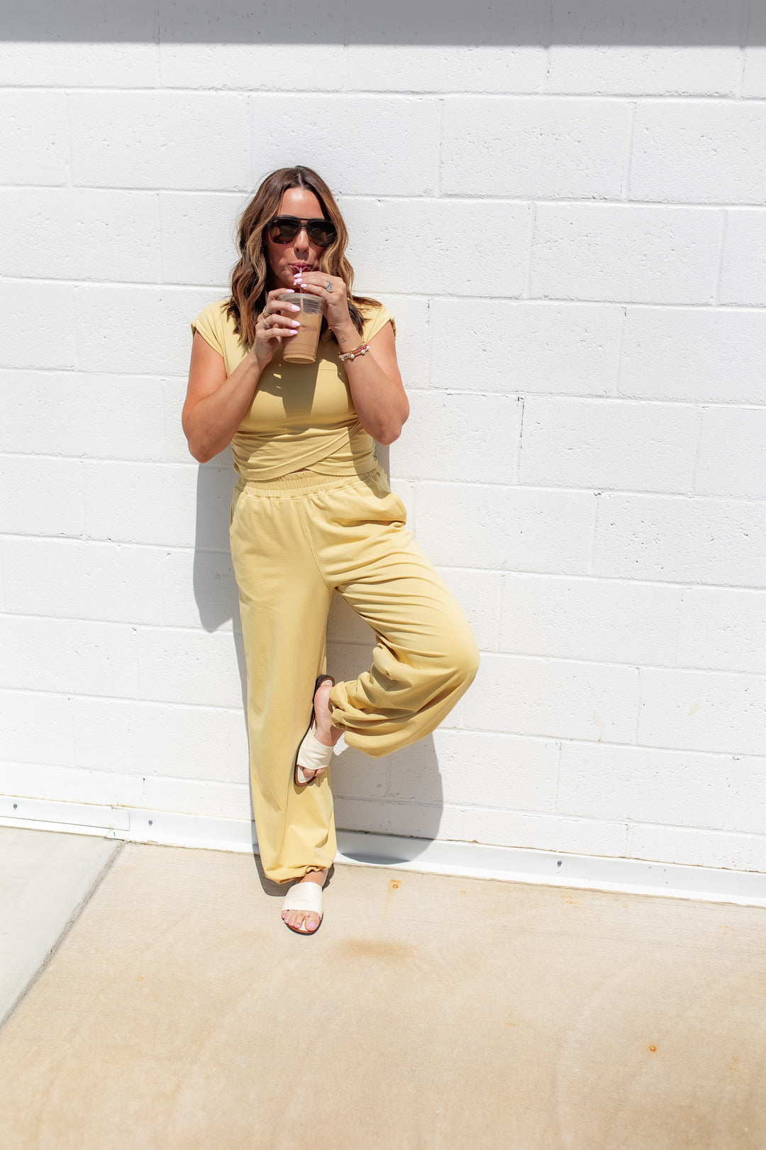 Yellow lounge set with soft fabric and matching top and pants styled for a casual everyday outfit