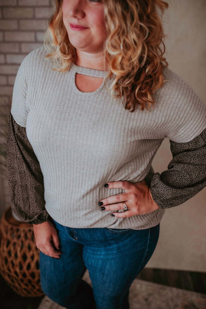 One Eleven Olive Boutique The Laykin Curvy Top Upgrade your fall style game with our adorable Curvy Girl taupe colored 'Laykin Top' featuring soft knit material patterned with a black leopard print and balloon sl