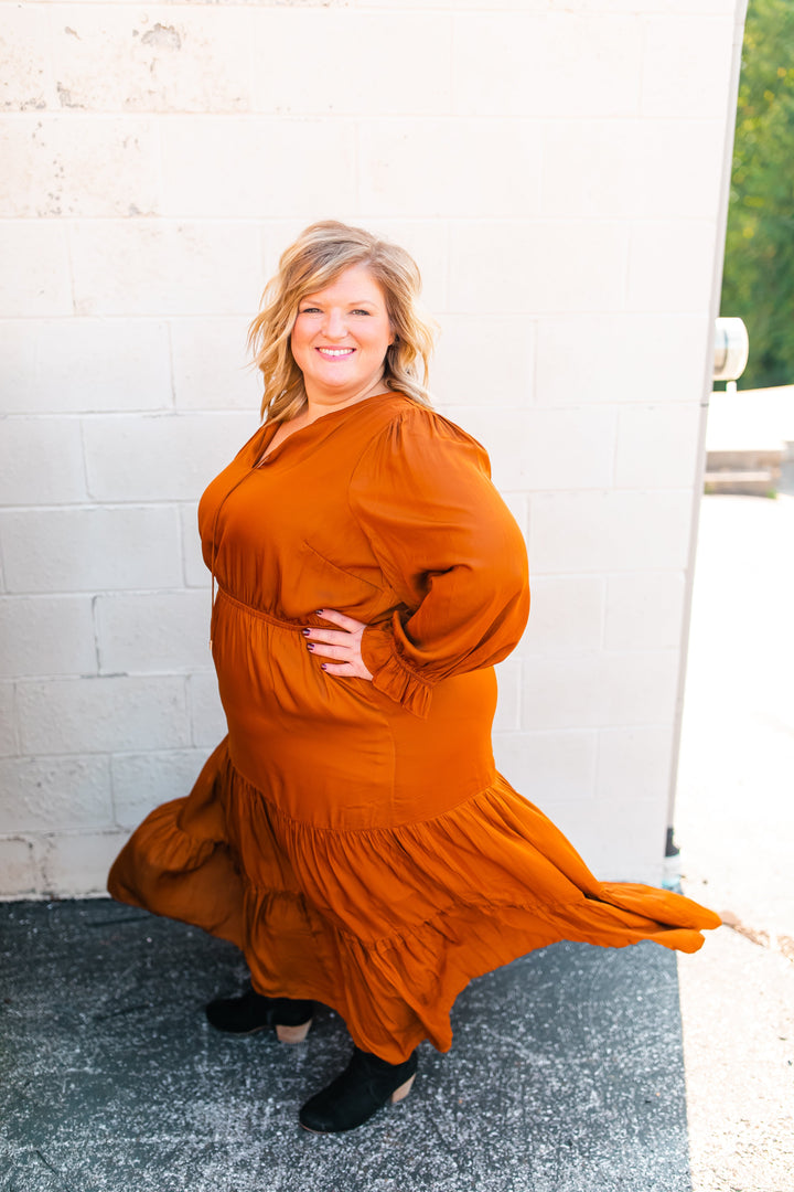 One Eleven Olive Boutique The Marlee Dress - Toffee (XS - 3XL) 
Toffee satin is sooo much better than regular plain toffee, amiright?! A classic piece that will be perfect for family pictures, weddings, and everything in between