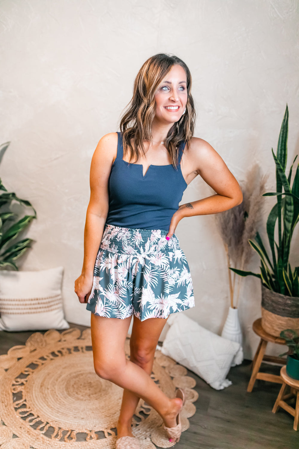 One Eleven Olive Boutique The Palm Breeze Shorts It's not nice to pick favorites, but the Palm Breeze shorts are our favorite- don't tell the other shorts. These cuties have such a fun print, a smocked waist, flowy