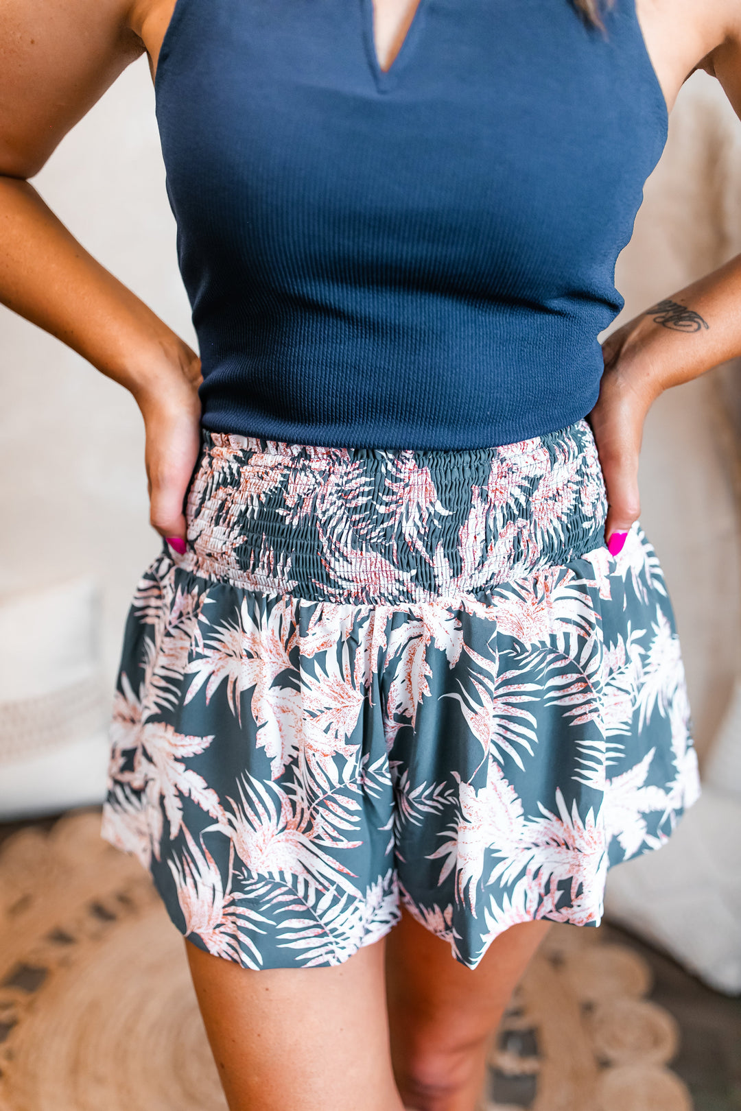 One Eleven Olive Boutique The Palm Breeze Shorts It's not nice to pick favorites, but the Palm Breeze shorts are our favorite- don't tell the other shorts. These cuties have such a fun print, a smocked waist, flowy
