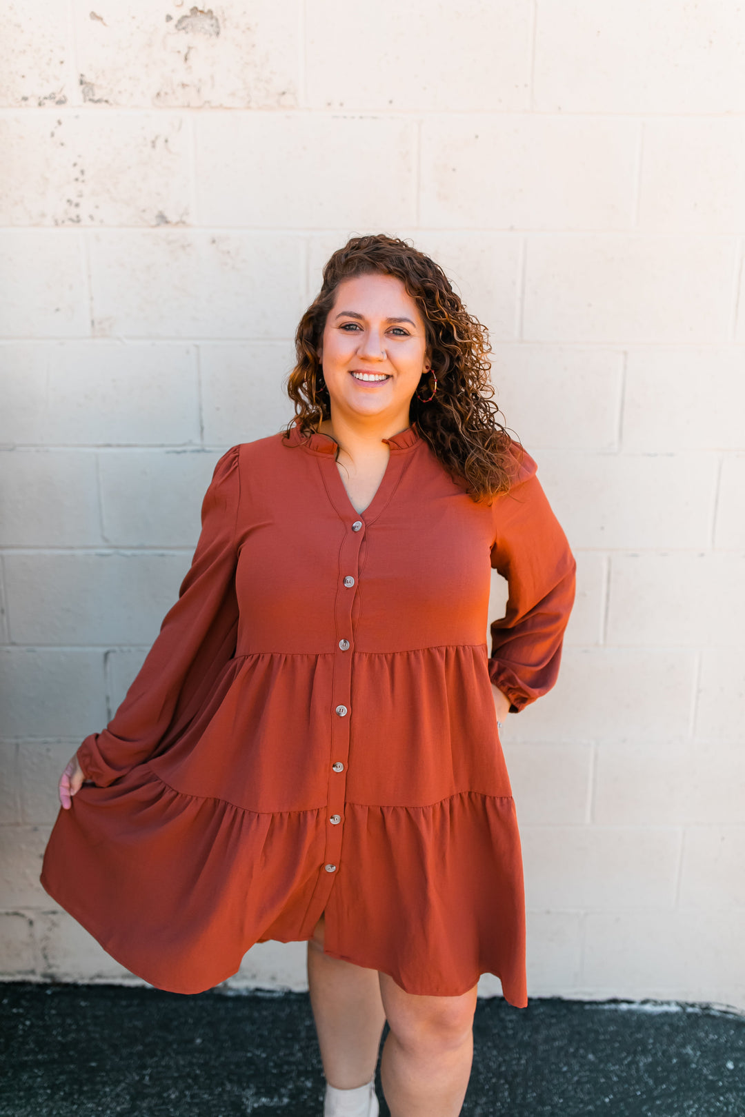 One Eleven Olive Boutique The Riley Button Up Dress (S-2XL) - Camel If you are in need of a flattering and easy throw together outfit, look no further than the Riley Button Up Dress! The color, the tiers, the buttons..the pockets! It