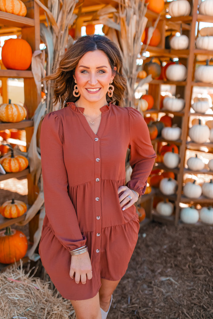 One Eleven Olive Boutique The Riley Button Up Dress (S-2XL) - Camel If you are in need of a flattering and easy throw together outfit, look no further than the Riley Button Up Dress! The color, the tiers, the buttons..the pockets! It